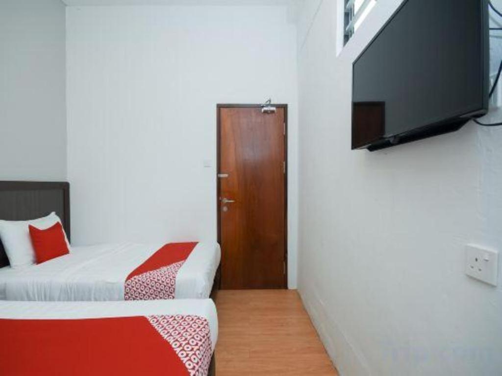 Oyo 1111 Harmony Stay Miri Exterior photo